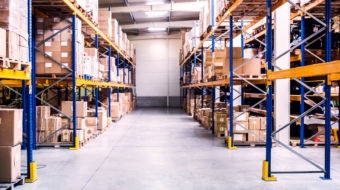 Shelves full of boxes in a warehouse.