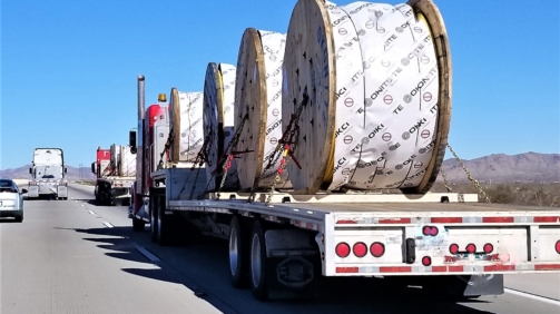 transportation-and-logistics-a-flat-bed-trailer-t20_nRPxy4